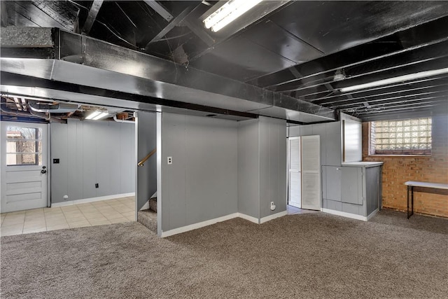 614 Tartan Dr, Monroeville, PA 15146 - below grade area with stairs, brick wall, and carpet flooring