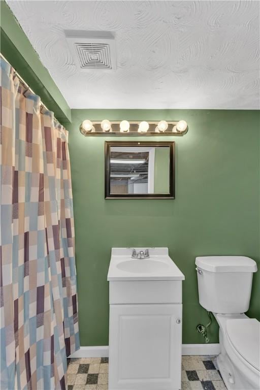 614 Tartan Dr, Monroeville, PA 15146 - bathroom with baseboards, visible vents, toilet, and vanity