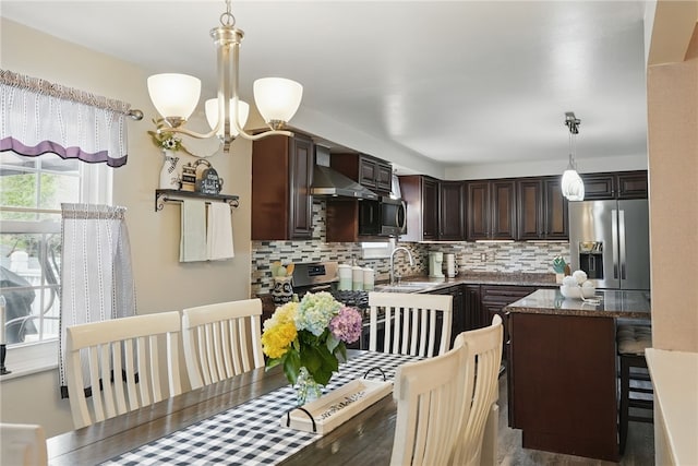 dining room featuring a notable chandelier