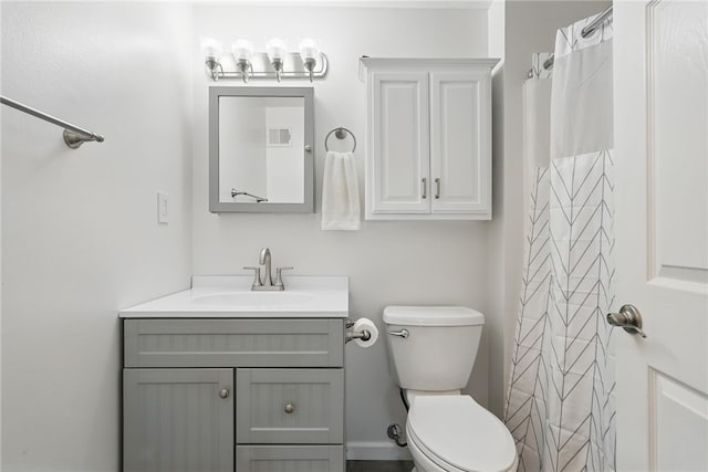 full bathroom with visible vents, toilet, and vanity