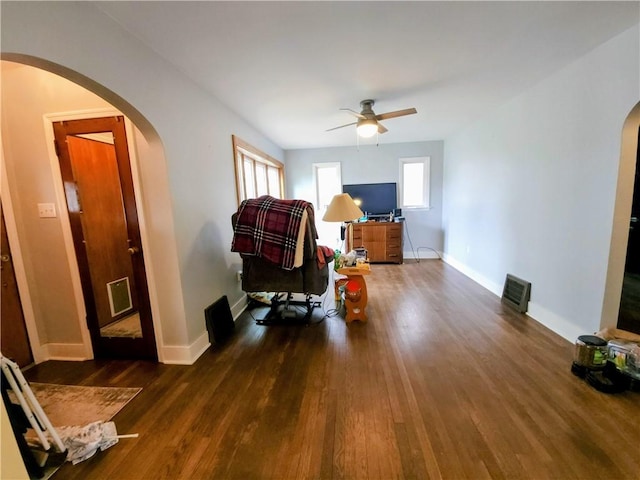418 Pine Hill Rd, W Kittanning Boro, PA 16201 - sitting room with arched walkways, wood finished floors, visible vents, and a ceiling fan