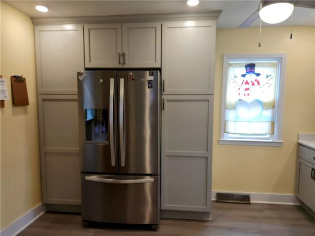 418 Pine Hill Rd, W Kittanning Boro, PA 16201 - kitchen with baseboards, visible vents, wood finished floors, ceiling fan, and stainless steel refrigerator with ice dispenser