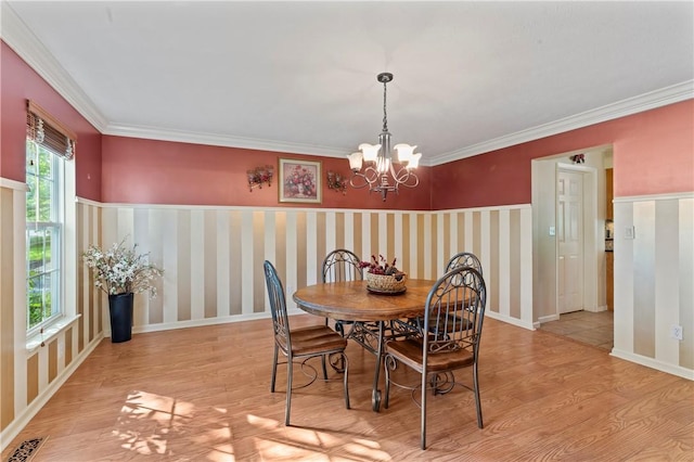 505 Luke Ct, Cranberry Twp, PA 16066 - dining space featuring light wood-style flooring, a chandelier, ornamental molding, and baseboards