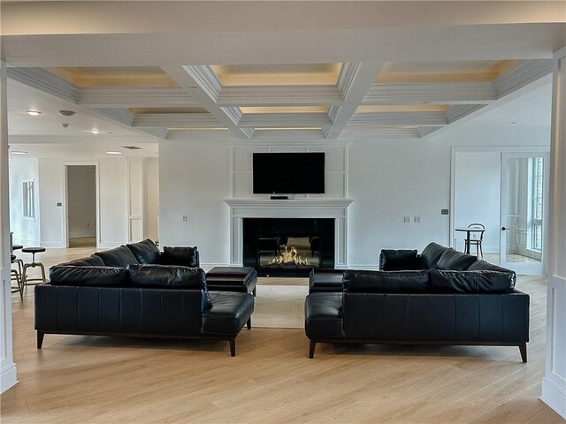 1 1st St Unit 413, Oakmont, PA 15139 - living area featuring beam ceiling, light wood-style floors, coffered ceiling, and crown molding