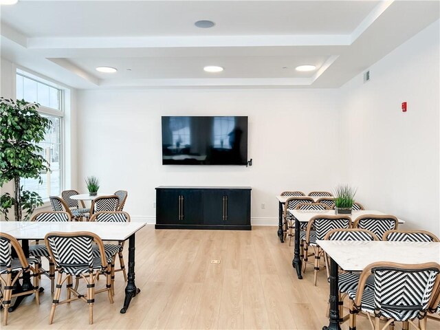1 1st St Unit 413, Oakmont, PA 15139 - dining area with a raised ceiling, visible vents, baseboards, and light wood-type flooring