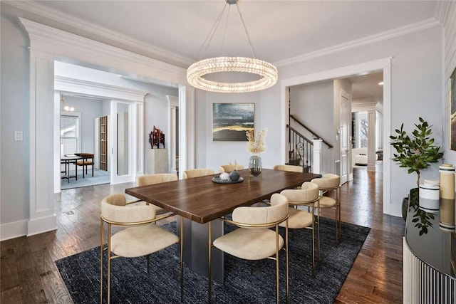 671 Chilliwack Ln, Marshall, PA 16046 - dining space with stairs, a notable chandelier, dark wood-style floors, and ornamental molding