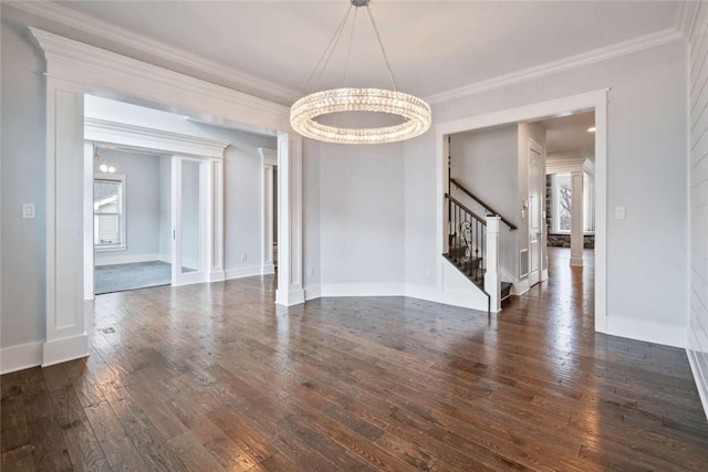 671 Chilliwack Ln, Marshall, PA 16046 - unfurnished dining area featuring dark wood-style flooring, a notable chandelier, crown molding, and stairs