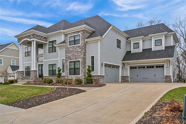 671 Chilliwack Ln, Marshall, PA 16046 - view of front of home featuring a garage, driveway, stone siding, and a shingled roof