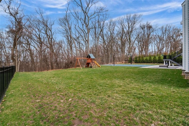 671 Chilliwack Ln, Marshall, PA 16046 - view of yard featuring fence, basketball court, and a playground