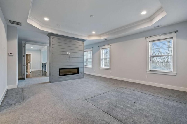 671 Chilliwack Ln, Marshall, PA 16046 - unfurnished living room featuring ornamental molding, a raised ceiling, and carpet