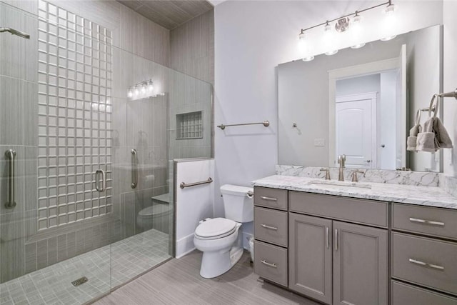 671 Chilliwack Ln, Marshall, PA 16046 - full bath featuring toilet, a stall shower, wood finished floors, and vanity