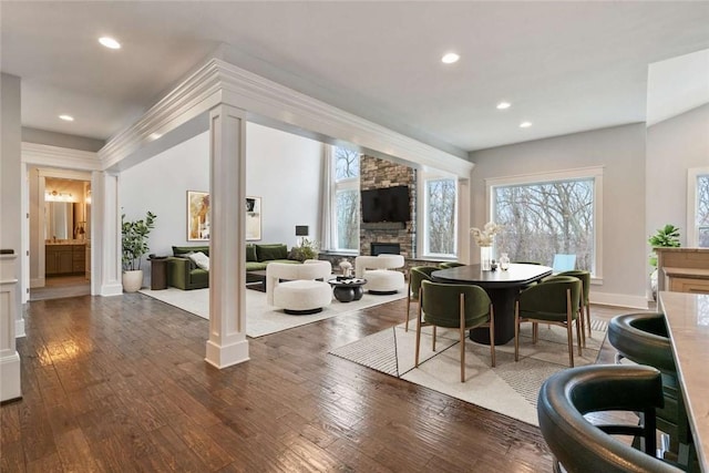 671 Chilliwack Ln, Marshall, PA 16046 - dining area featuring a stone fireplace, recessed lighting, hardwood / wood-style floors, and baseboards