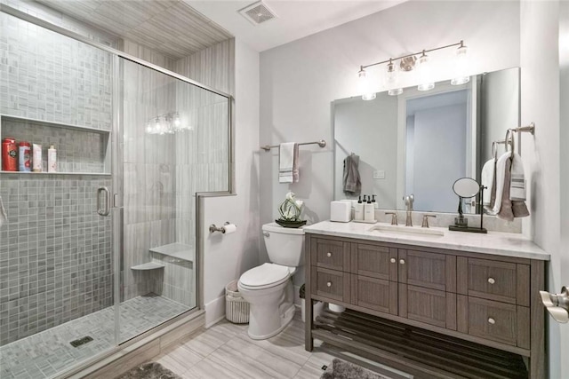 671 Chilliwack Ln, Marshall, PA 16046 - bathroom featuring a shower stall, vanity, visible vents, and toilet