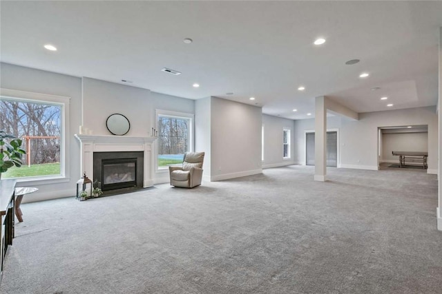 671 Chilliwack Ln, Marshall, PA 16046 - unfurnished living room featuring recessed lighting, a fireplace with flush hearth, carpet, and visible vents