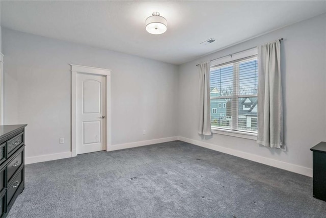 671 Chilliwack Ln, Marshall, PA 16046 - spare room with baseboards, dark colored carpet, and visible vents