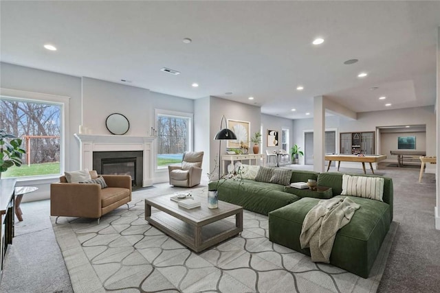 671 Chilliwack Ln, Marshall, PA 16046 - living area with light carpet, recessed lighting, a fireplace with flush hearth, and visible vents