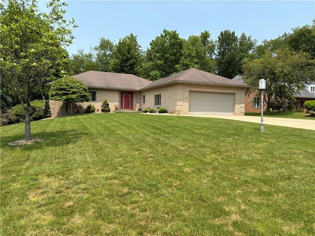 129 Lakeshore Dr, Center Twp But, PA 16001 - ranch-style house with an attached garage, a front yard, concrete driveway, and brick siding