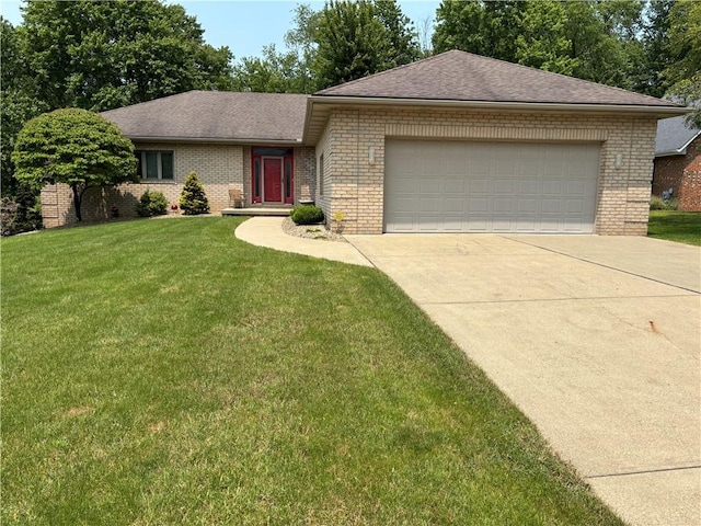 129 Lakeshore Dr, Center Twp But, PA 16001 - ranch-style house with brick siding, driveway, an attached garage, and a front lawn