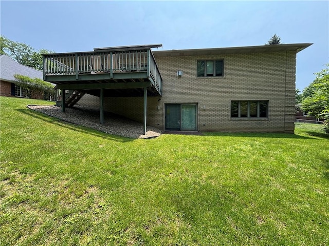 129 Lakeshore Dr, Center Twp But, PA 16001 - back of property with a deck, brick siding, a yard, and stairway