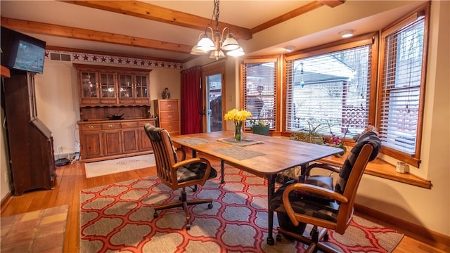 612 Freeport Rd, South Buffalo Twp, PA 16229 - dining room with light wood finished floors, plenty of natural light, a chandelier, and beam ceiling