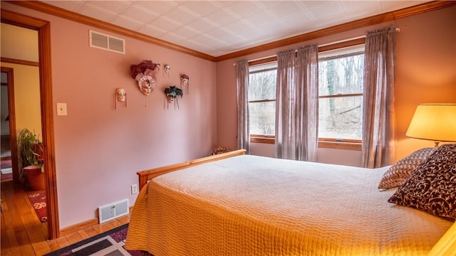 612 Freeport Rd, South Buffalo Twp, PA 16229 - bedroom featuring hardwood / wood-style floors, ornamental molding, and baseboards