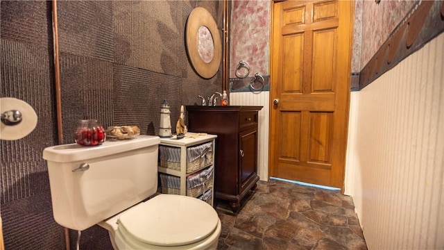 612 Freeport Rd, South Buffalo Twp, PA 16229 - half bathroom featuring stone finish floors, toilet, and vanity