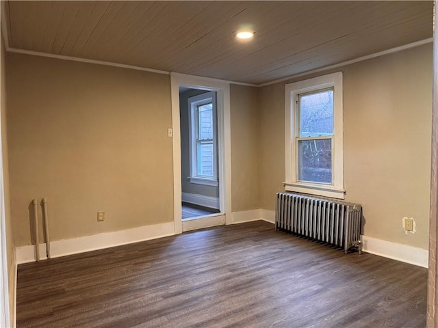 528 3rd St, Charleroi Boro, PA 15022 - spare room with wood ceiling, radiator, dark wood-type flooring, and crown molding