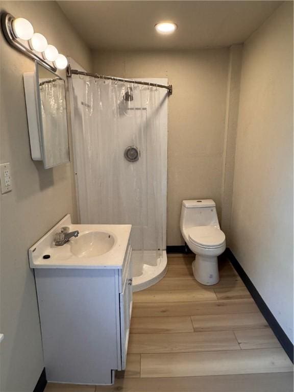 528 3rd St, Charleroi Boro, PA 15022 - full bathroom featuring toilet, curtained shower, vanity, wood finished floors, and baseboards