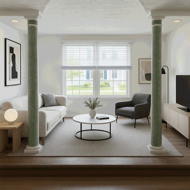 114 Adella Ct, Penn Twp Wml, PA 15644 - living room with decorative columns, a textured ceiling, and wood finished floors