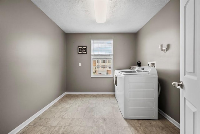 1768 Haflinger Dr, North Huntingdon, PA 15642 - laundry area featuring separate washer and dryer, baseboards, laundry area, and a textured ceiling