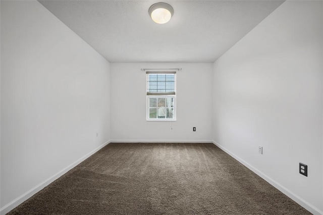 1768 Haflinger Dr, North Huntingdon, PA 15642 - spare room featuring baseboards and dark carpet