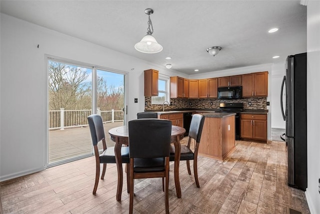 1768 Haflinger Dr, North Huntingdon, PA 15642 - dining area with baseboards, recessed lighting, and light wood-style flooring