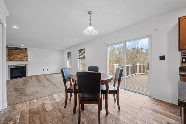 1768 Haflinger Dr, North Huntingdon, PA 15642 - dining space featuring recessed lighting, baseboards, a fireplace, and hardwood / wood-style flooring