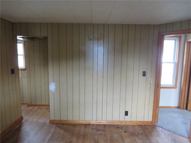 413 S 5th St, West Newton, PA 15089 - empty room featuring hardwood / wood-style floors and wooden walls