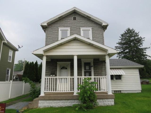 413 S 5th St, West Newton, PA 15089 - view of front of house with covered porch and stone siding