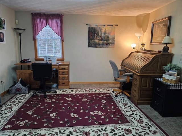 office space featuring baseboards