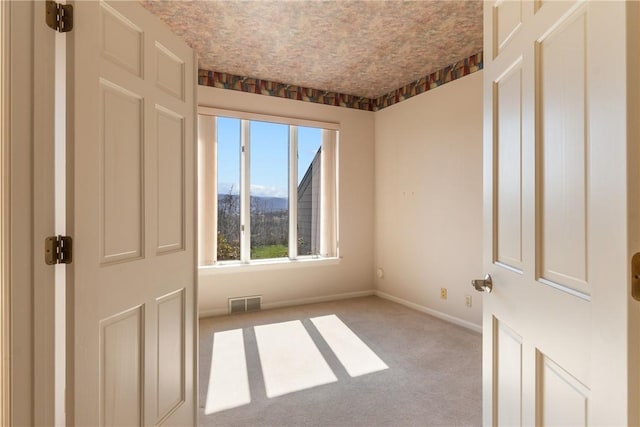 2036 Revere Dr, Connellsville, PA 15425 - carpeted spare room featuring baseboards and a mountain view