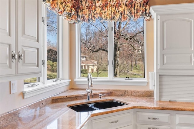 2036 Revere Dr, Connellsville, PA 15425 - kitchen featuring a sink and white cabinetry