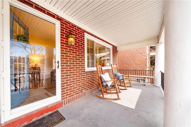 view of patio featuring a porch