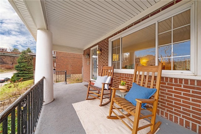 view of patio featuring a porch
