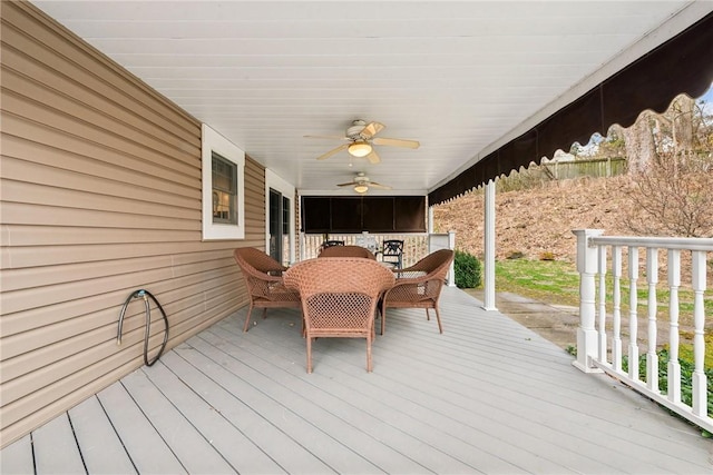 wooden terrace featuring ceiling fan