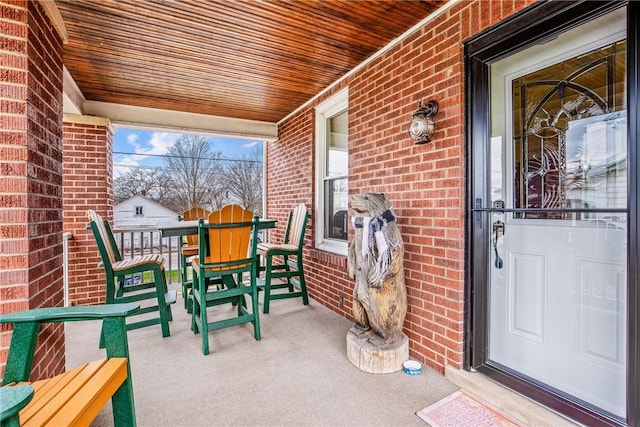 view of patio featuring a porch