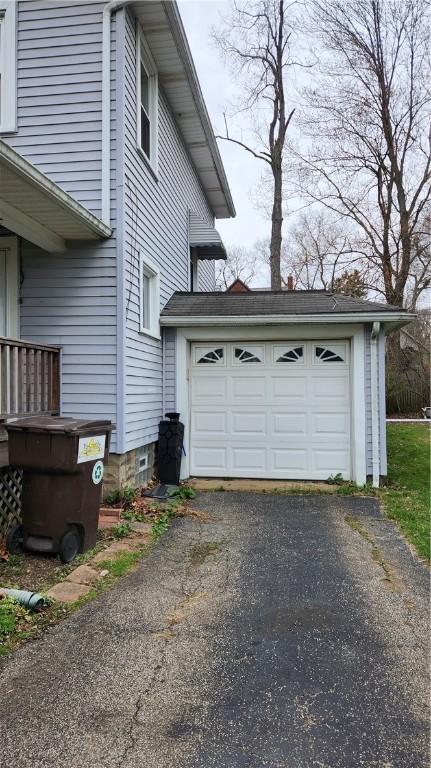613 Terrace Ave, Grove City Boro, PA 16127 - view of property exterior featuring a garage and aphalt driveway