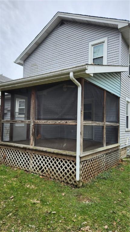 613 Terrace Ave, Grove City Boro, PA 16127 - view of home's exterior with a lawn and a sunroom