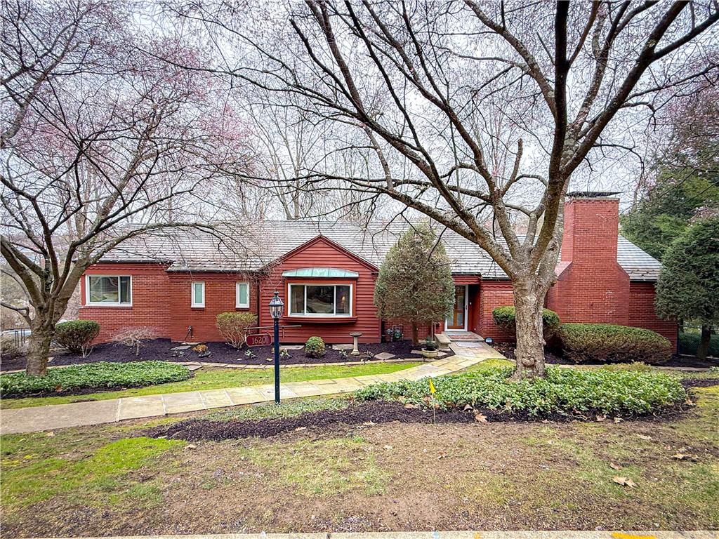 1620 Williamsburg Rd, Mt Lebanon, PA 15243 - view of front of property featuring brick siding, entry steps, and a chimney