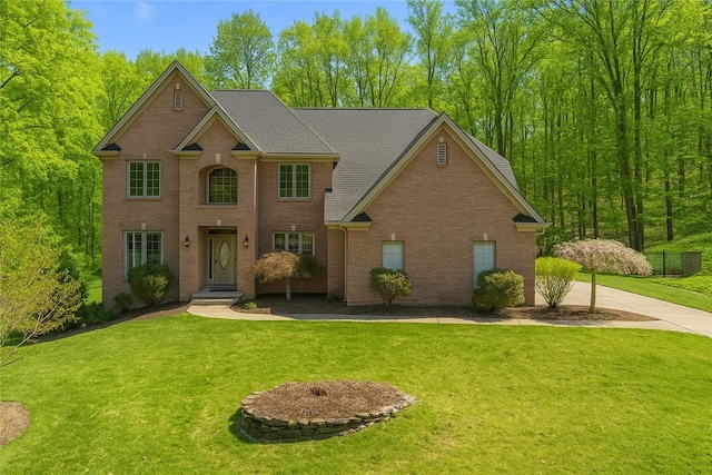 128 Crystal Springs Dr, Cranberry Twp, PA 16066 - view of front facade featuring a front yard and brick siding
