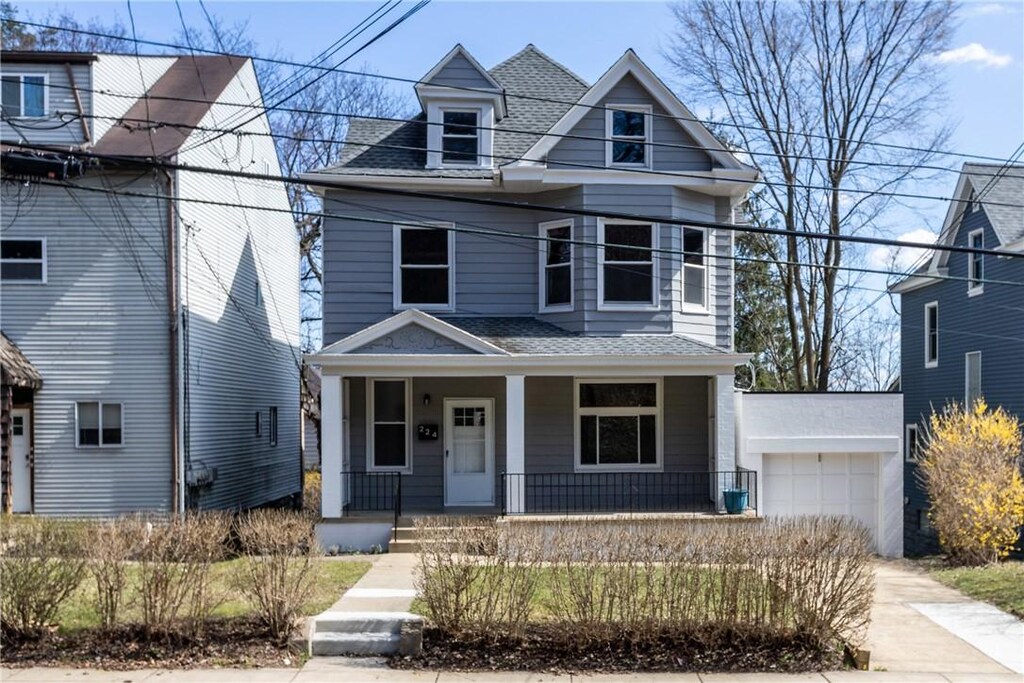 224 N Balph Ave, Bellevue, PA 15202 - view of front of house featuring a shingled roof, concrete driveway, and a porch