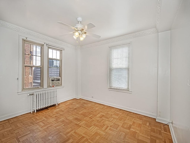 144 N Dithridge St Unit 510, Oakland, PA 15213 - spare room featuring cooling unit, radiator, ceiling fan, and baseboards