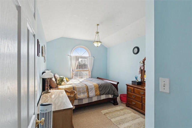 bedroom featuring carpet flooring and lofted ceiling