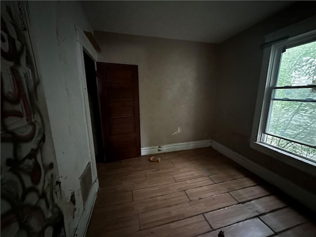801 Butler Ave, New Castle/4Th, PA 16101 - empty room featuring wood finished floors and baseboards